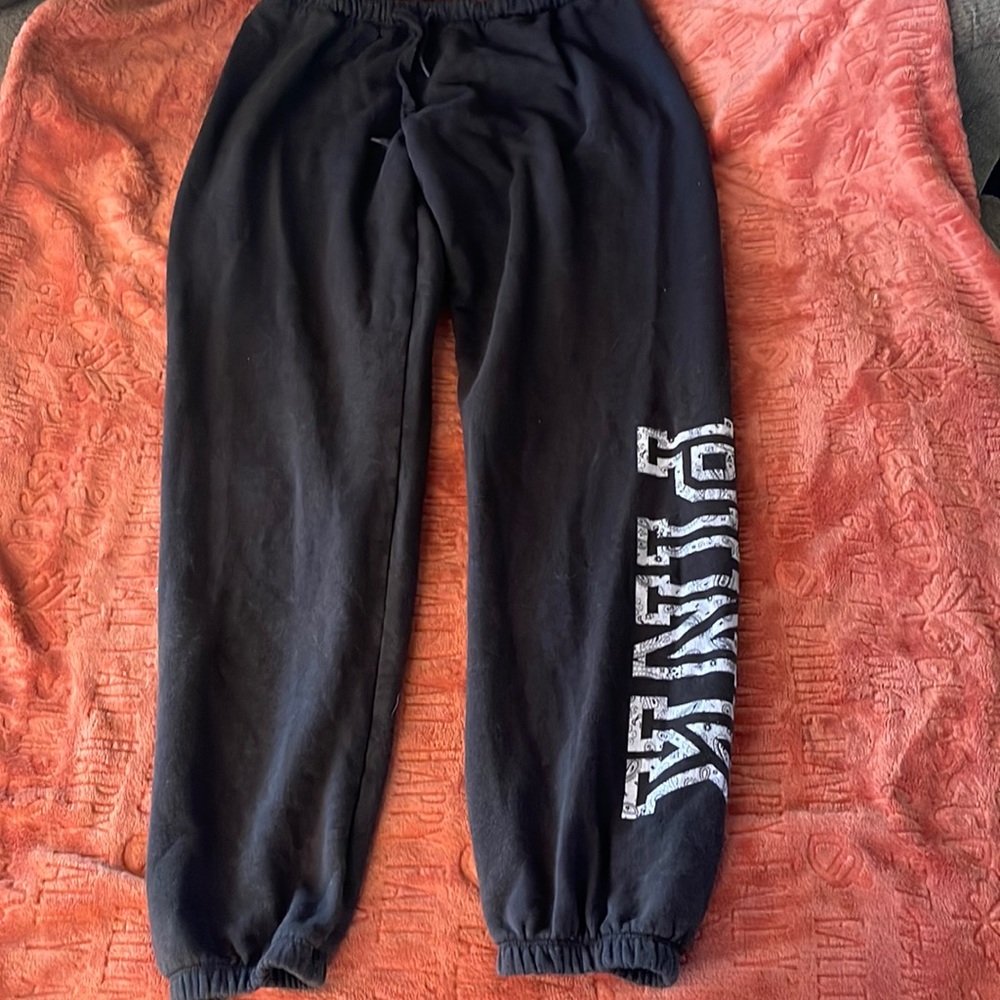 Women’s pink sweatpants size small.